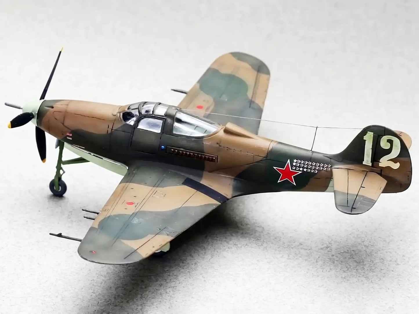 RS Models 92218 P-400 'White 12' s/n BX237 of 19 GvIAP, pilot P. Kutakhov. Upper port view.