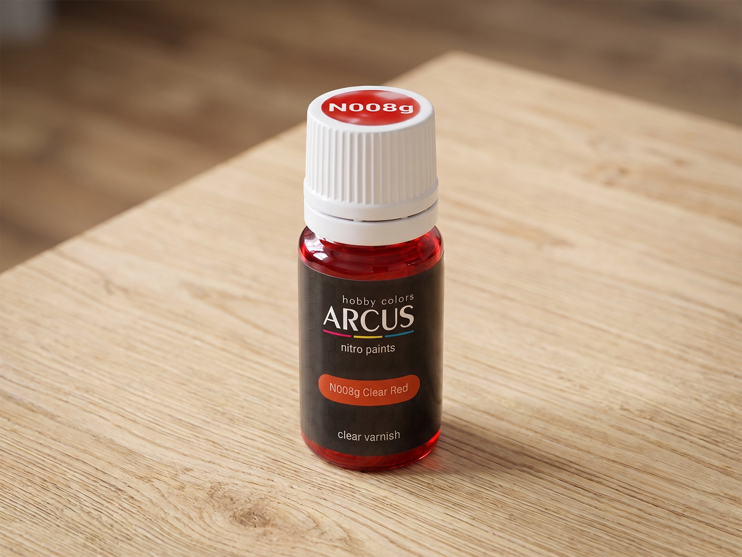 Arcus 008 Clear Red bottle