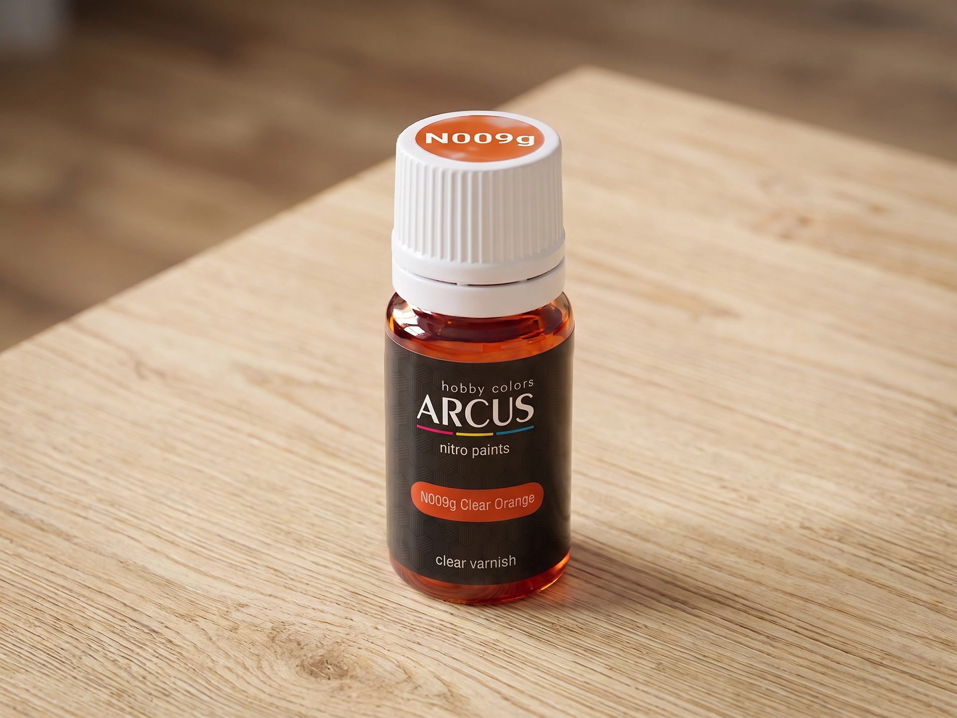 Arcus 009 Clear Orange bottle