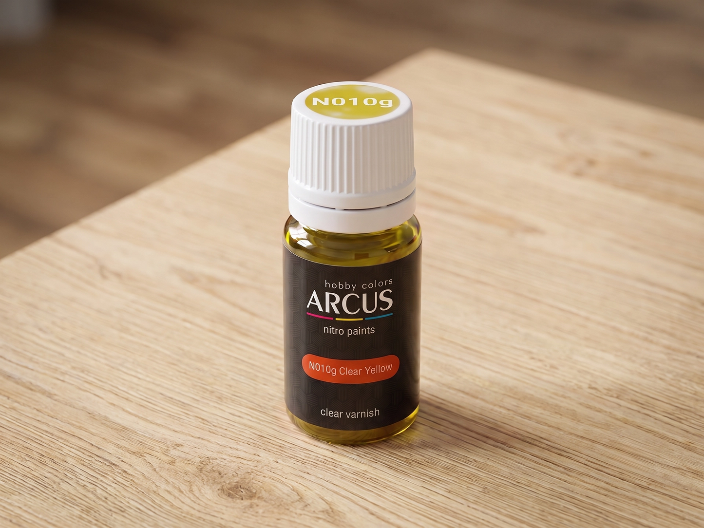 Arcus 010 Clear Yellow bottle