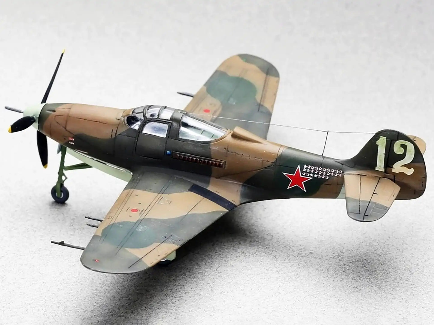 RS Models 92218 P-400 'White 12' s/n BX237 of 19 GvIAP, pilot P. Kutakhov. Upper port view.