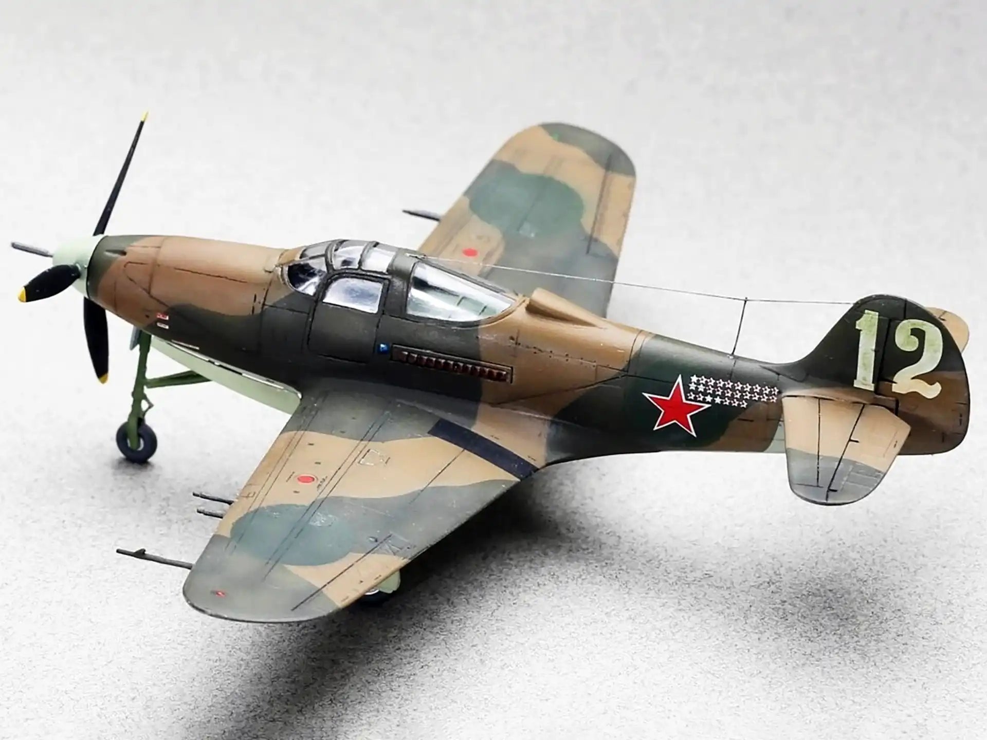 RS Models 92218 P-400 'White 12' s/n BX237 of 19 GvIAP, pilot P. Kutakhov. Upper port view.